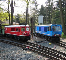 Picture with two battery-electric locomotives